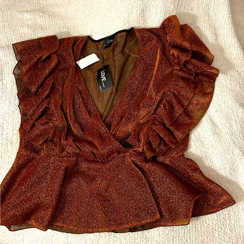 Orange you the Baddest Peplum Top!! 🧡💁🏾‍♀️